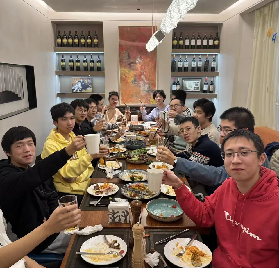 A student union gathering around the dinner table
