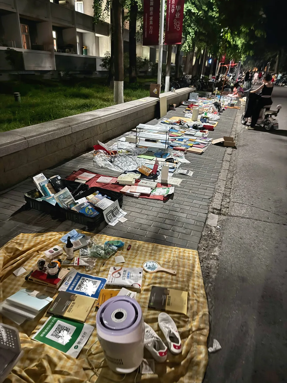 Books laid out during graduation season at Peking University