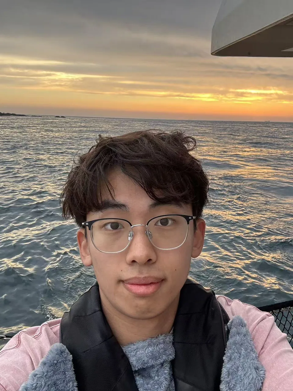A selfie by the sea at sunset on Jeju